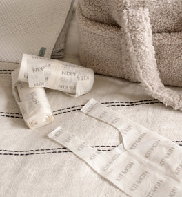 A roll of Kit & Kin biodegradable nappy bags, baby changing bag essential for changes on the go